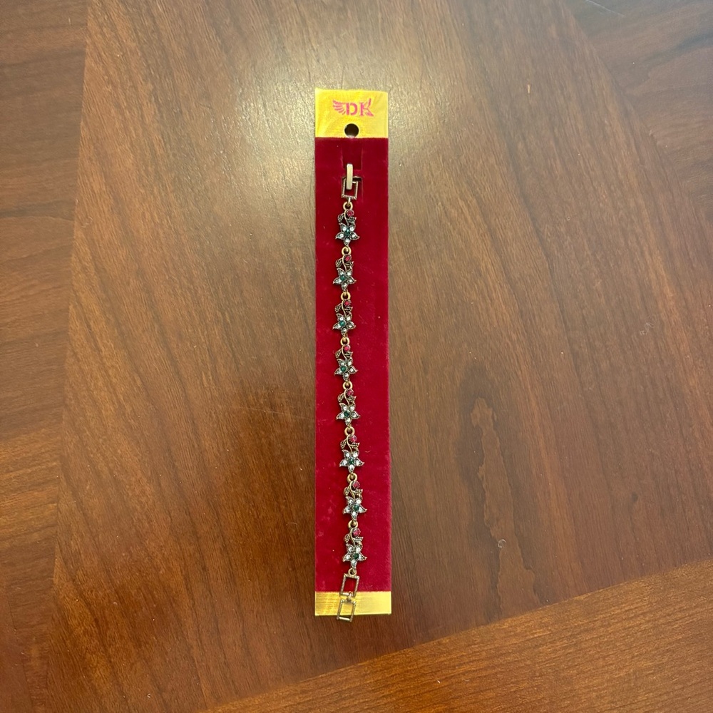 Floral Gold Tone Bracelet with Pink and Green Accents